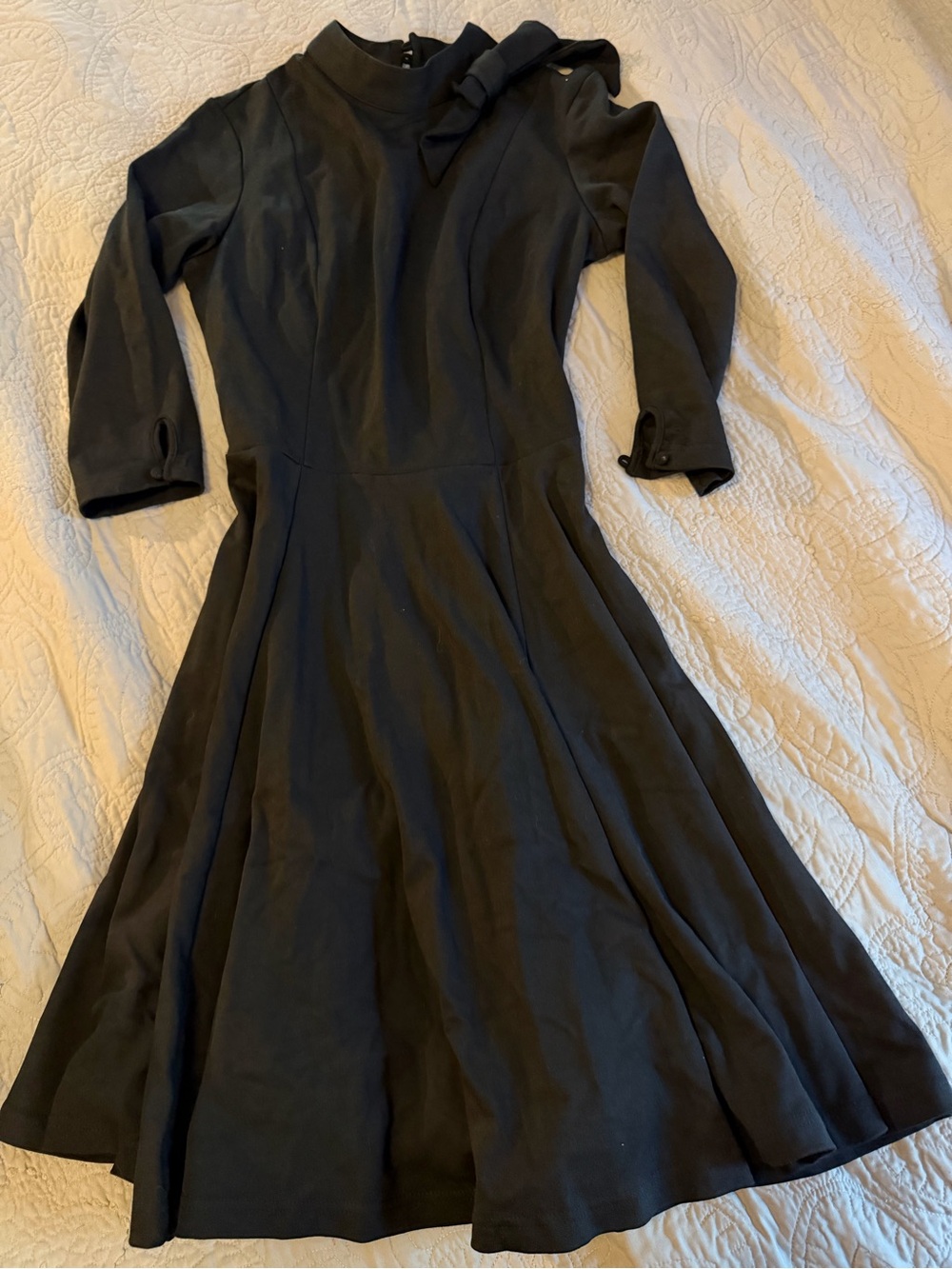 Unique Vintage Black Fit-and-Flare midi with Bow Detail at neck- 50’s inspied